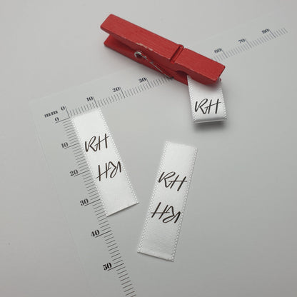 #05WS - WHITE SATIN LOGO PIP LABELS