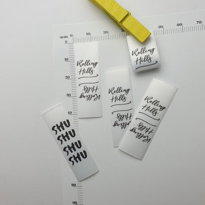 #05WS - WHITE SATIN LOGO PIP LABELS