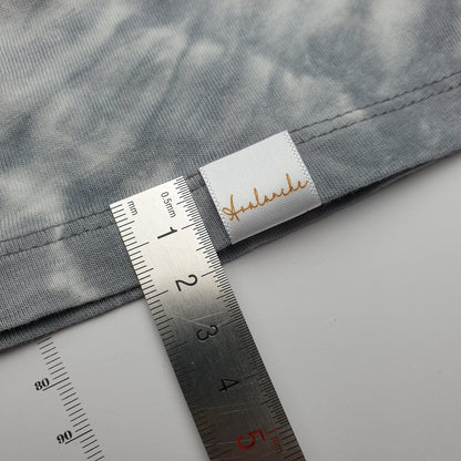 #09WS - HOT CUT SATIN HEM LABELS