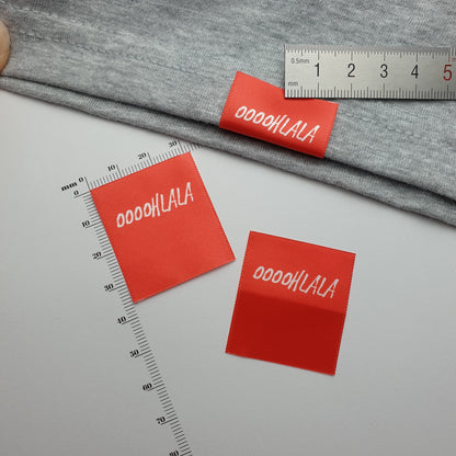 #09WS - HOT CUT SATIN HEM LABELS
