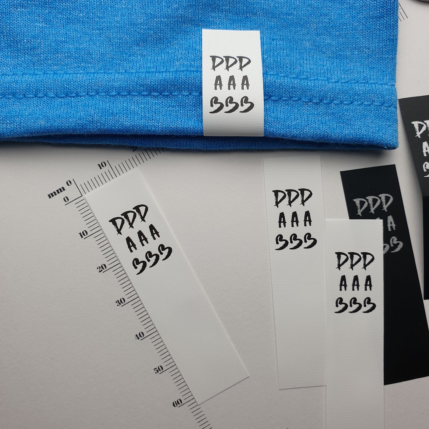 #07WPT - SEMI-PERMANENT SINGLE COLOUR PRINTED WHITE POLYESTER TAPE HEM LABELS