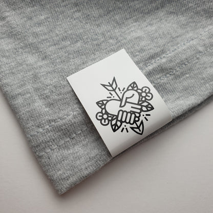 #07WPT - SEMI-PERMANENT SINGLE COLOUR PRINTED WHITE POLYESTER TAPE HEM LABELS