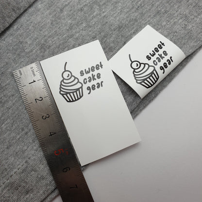 #07WPT - SEMI-PERMANENT SINGLE COLOUR PRINTED WHITE POLYESTER TAPE HEM LABELS