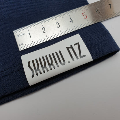 #07WPT - SEMI-PERMANENT SINGLE COLOUR PRINTED WHITE POLYESTER TAPE HEM LABELS