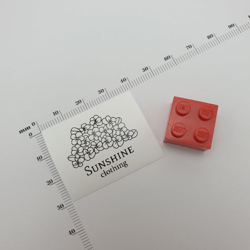 #12WPT - WHITE POLYESTER TAPE SEW-ON-FLAT LABELS